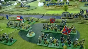 The gallant Pender storms forward on the right whilst the Rebel centre is left 'confused' 